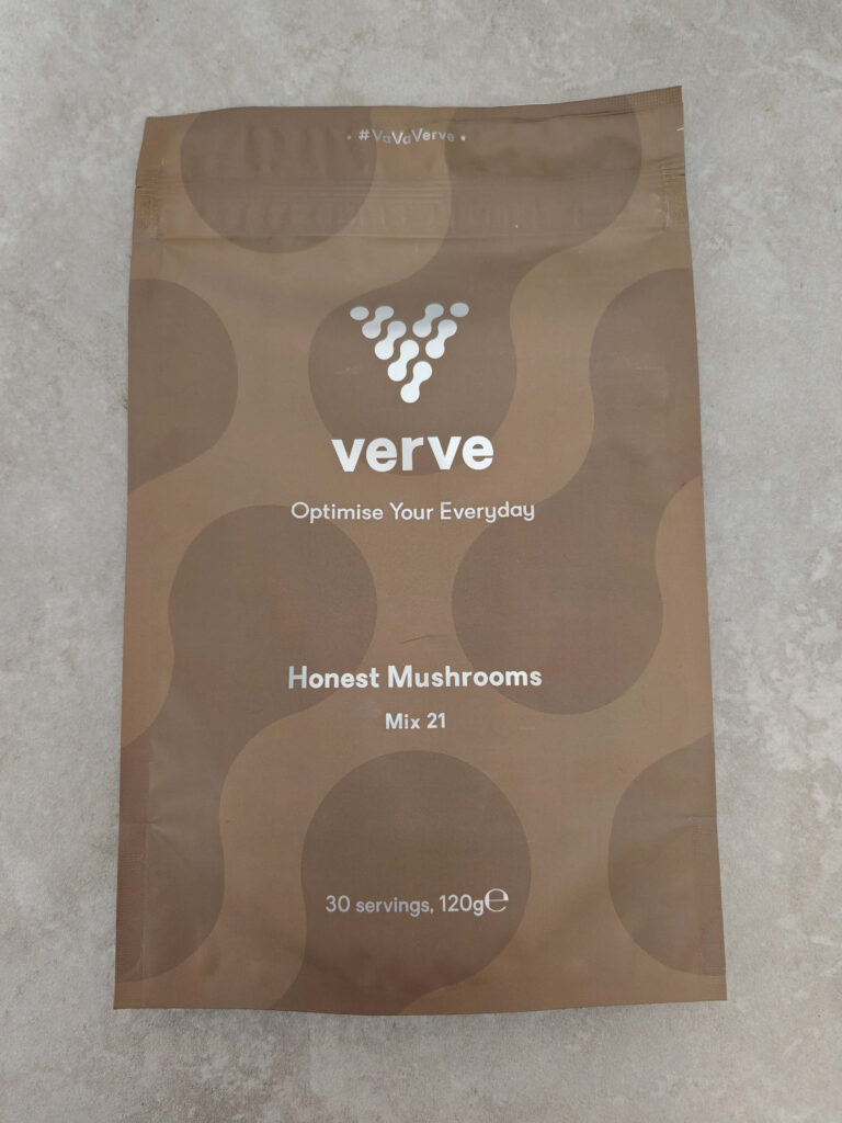 Verve Honest Mushrooms Mix 21 packaging on a grey surface, 120g for 30 servings, promoting daily optimisation.