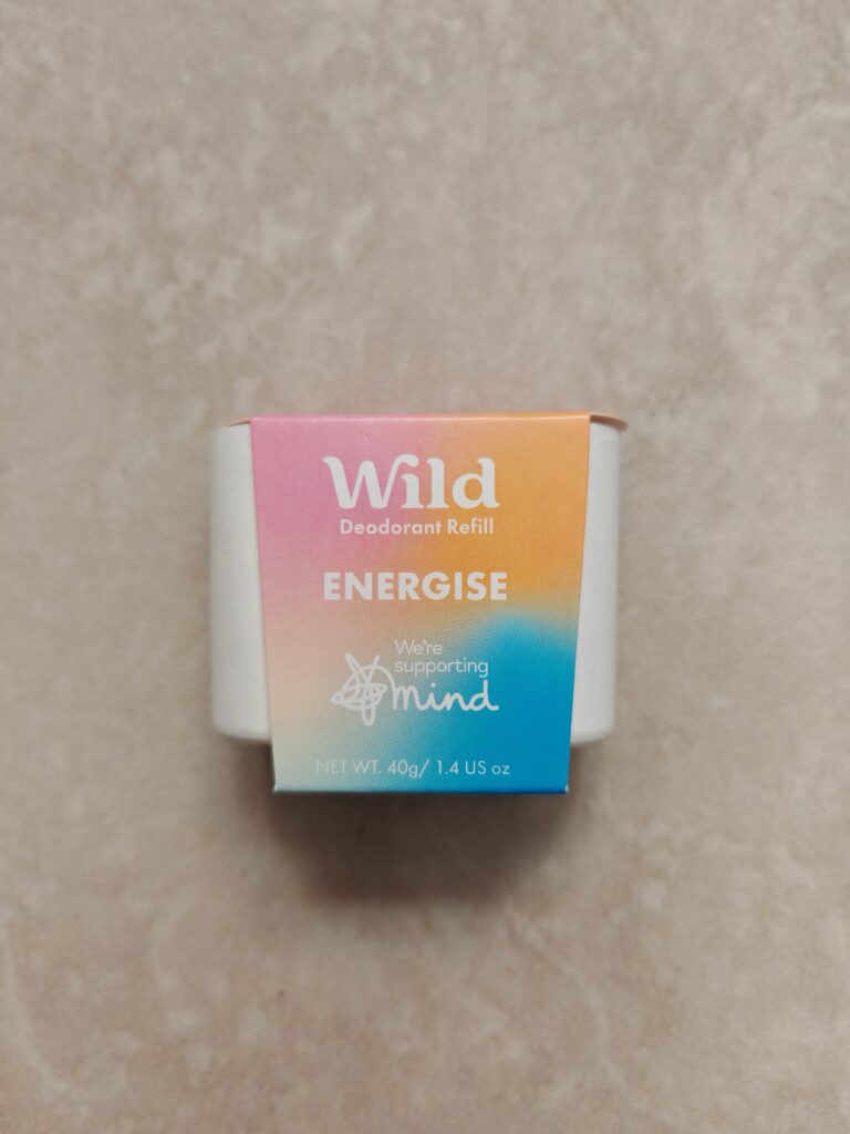 Colourful Wild deodorant refill on a neutral background, highlighting sustainable personal care in eco-friendly packaging.