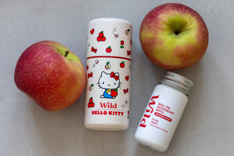 Hello Kitty Wild deodorant and refill with apples, featuring red apple scent for fresh 72-hour sweat control.