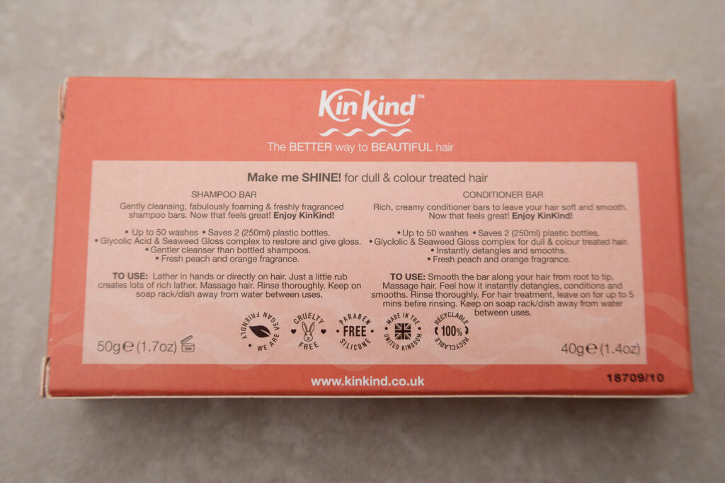 KinKind shampoo and conditioner bar packaging for dull, colour treated hair, peach and orange fragrance, eco-friendly.