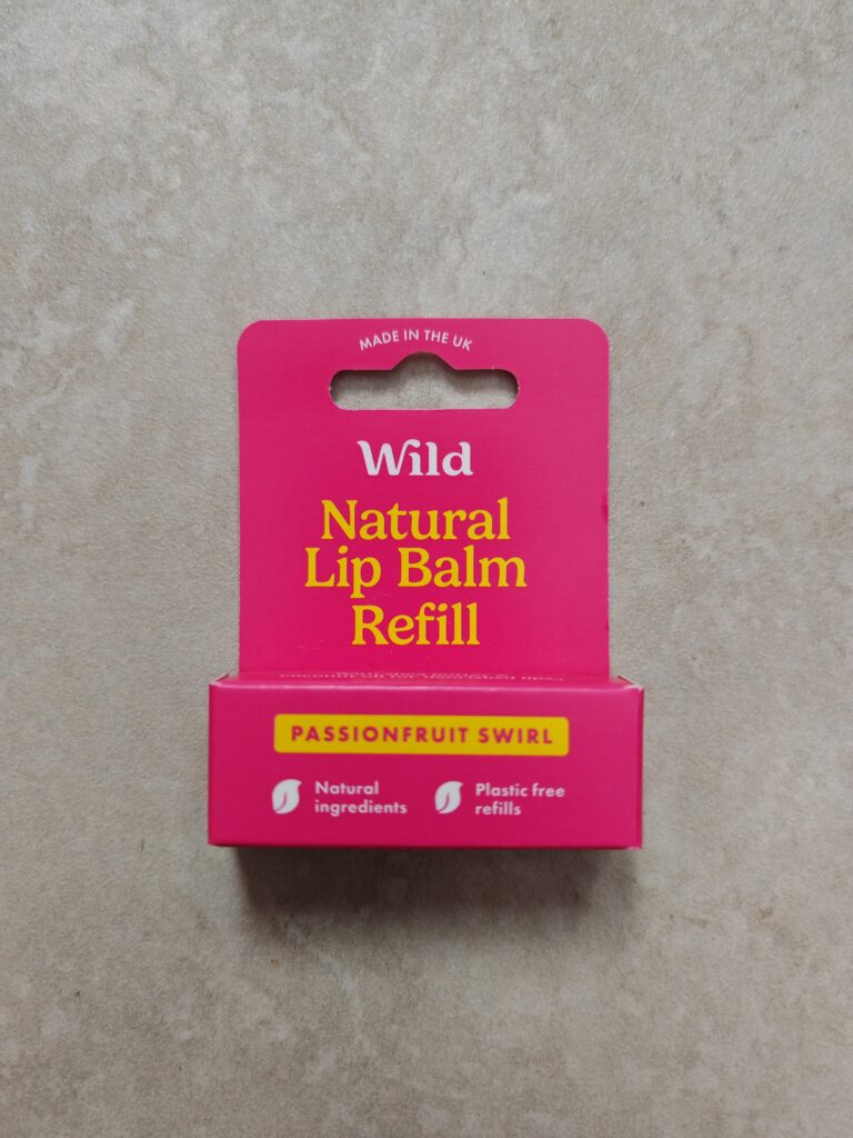 Wild Natural Lip Balm Refill box in Passionfruit Swirl, showcasing natural ingredients and plastic-free packaging.